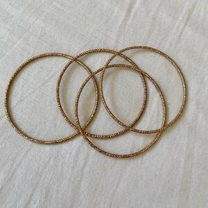 GOLD BANGLES‎